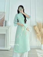 SUMMER Modern Mint taffeta ao dai with pearls and 3D lily of the valley flowers