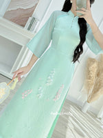SUMMER Modern Mint taffeta ao dai with pearls and 3D lily of the valley flowers
