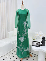 CLAIRE Dark Green ao dai with handed beading flowers