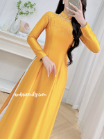 ALAIA Gold Ao dài with hand beading collar