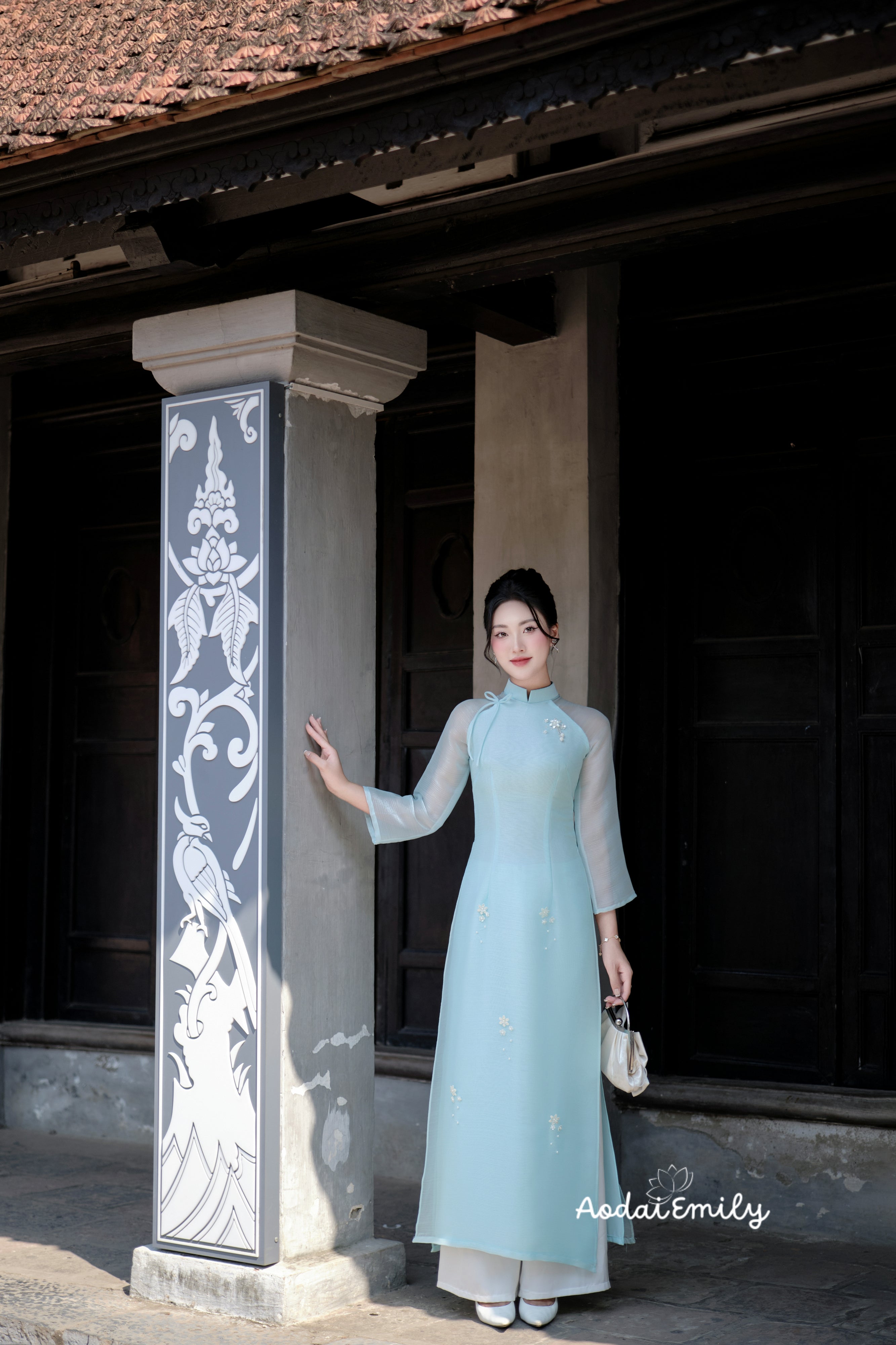 Double layers modern ao dai with hand beaded flowers |