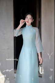 Double layers modern ao dai with hand beaded flowers |