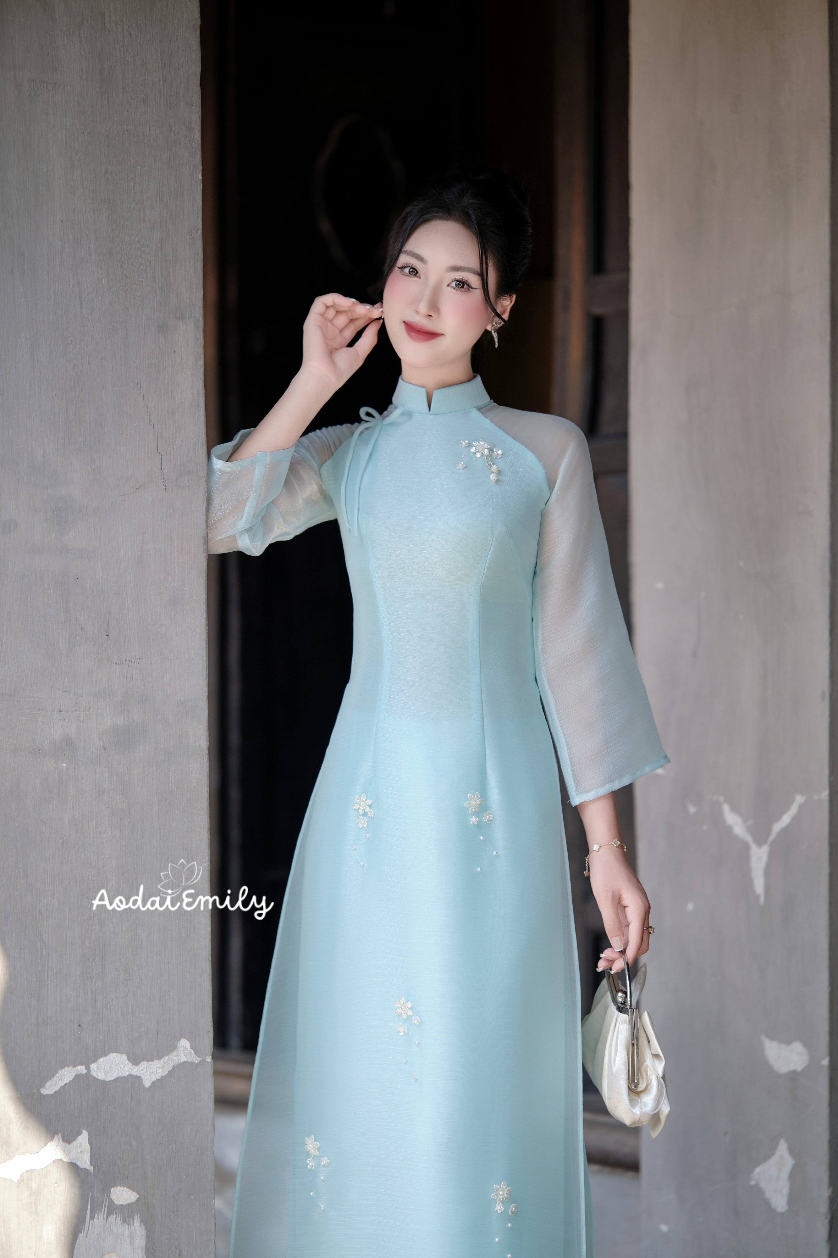 Double layers modern ao dai with hand beaded flowers |