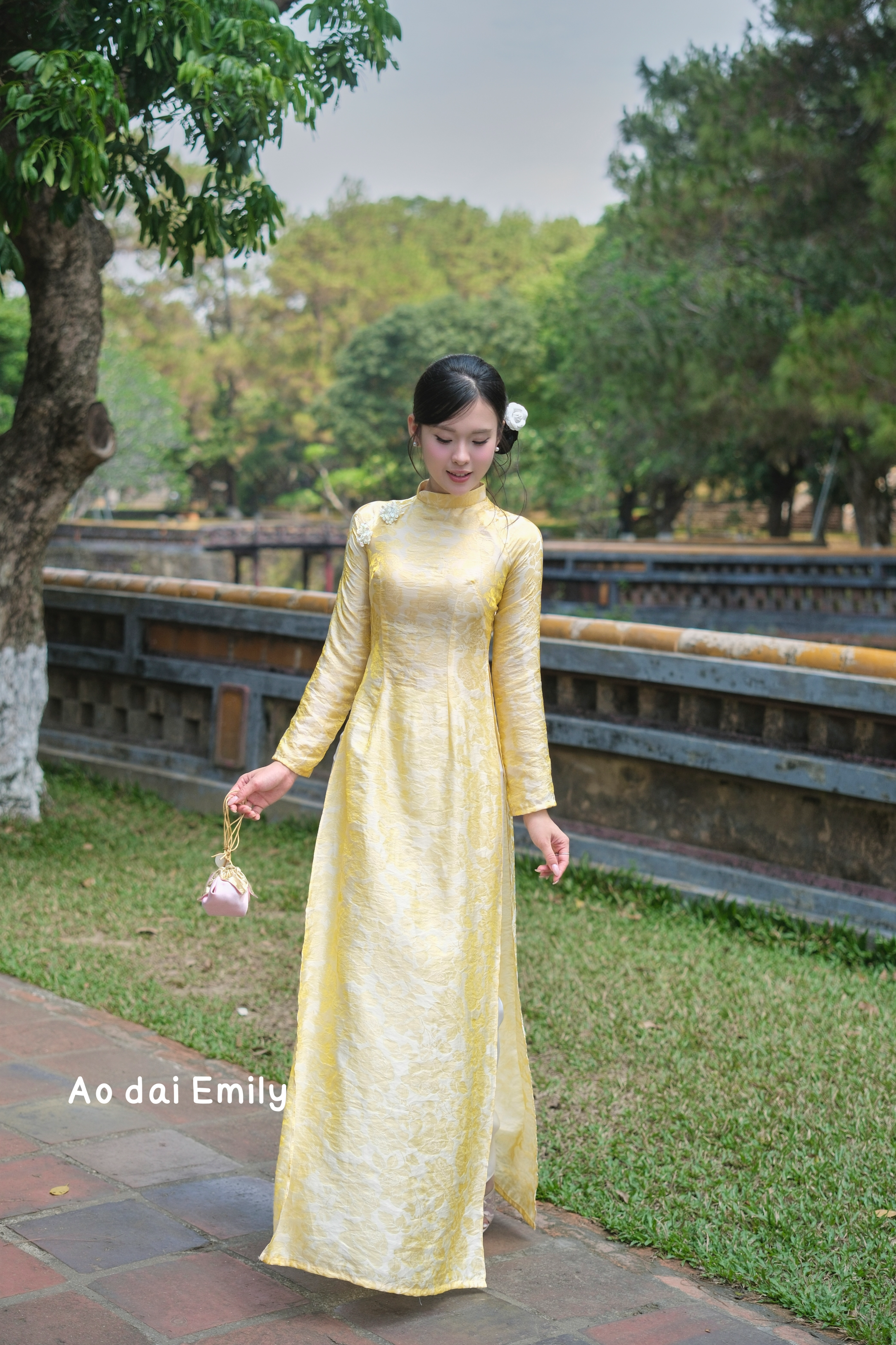 Yellow traditional áo dài with crystal buttons | Spring beauty