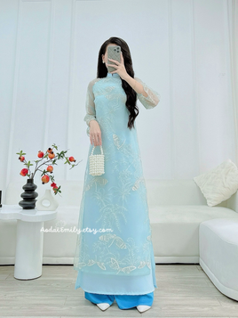LUCY Blue Modern ao dai with embroidery patterns