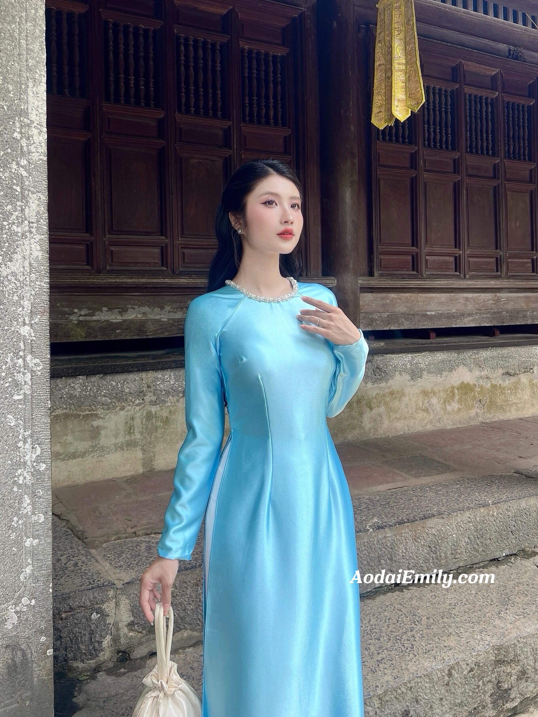 Plain light blue ao dai with crystals collar|