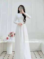 White ao dai with simple crystals round collar