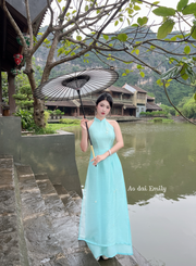 Sleeveless ao dai with simple hand beading flowers| Ayana