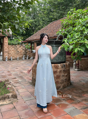 Modern Sleeveless ao dai with simple hand beading flowers| Lyssa