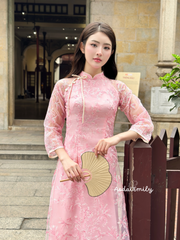 Pink modern ao dai with embroidery flowers and bows