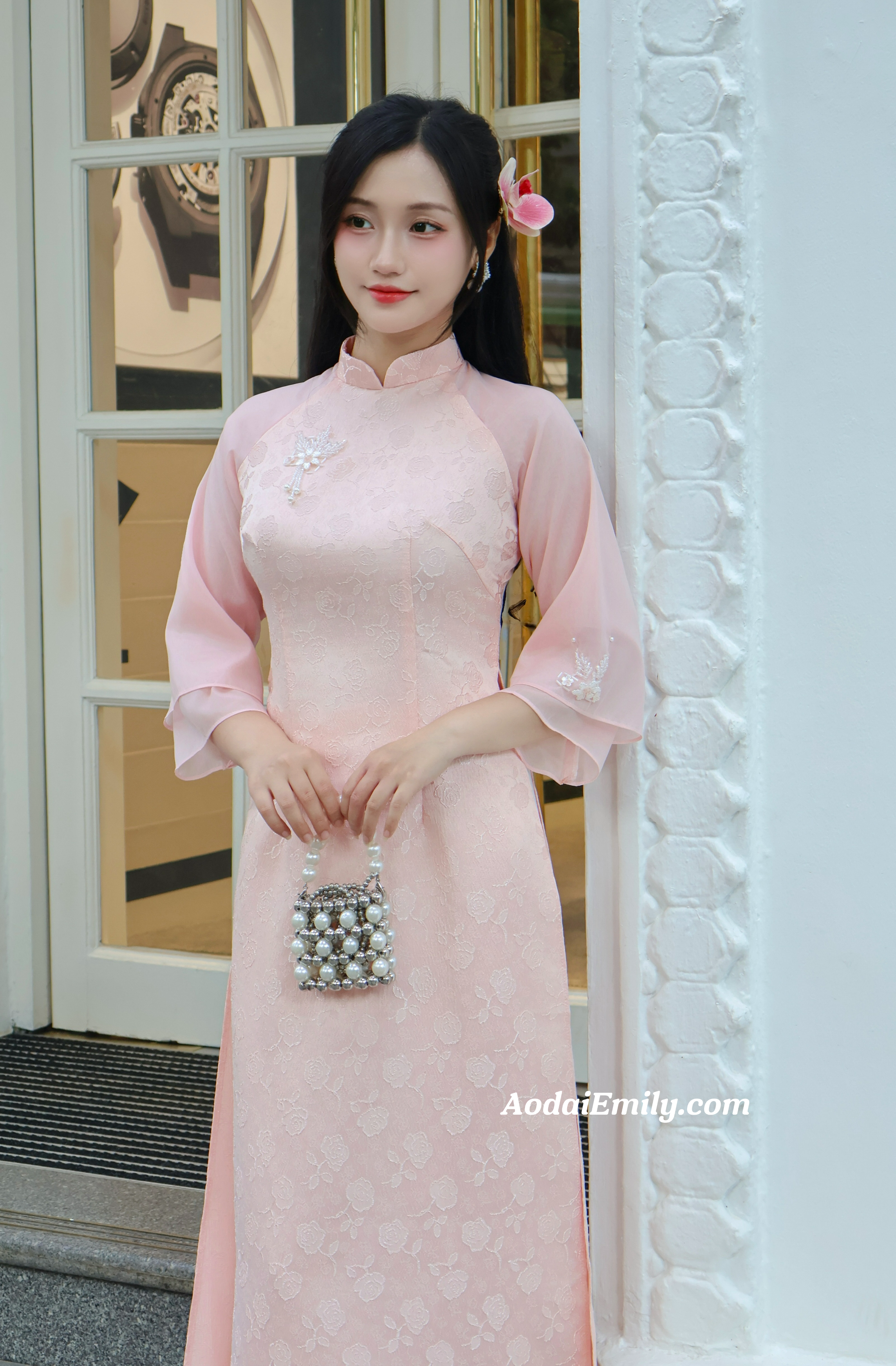 Pink modern ao dai with hand beading