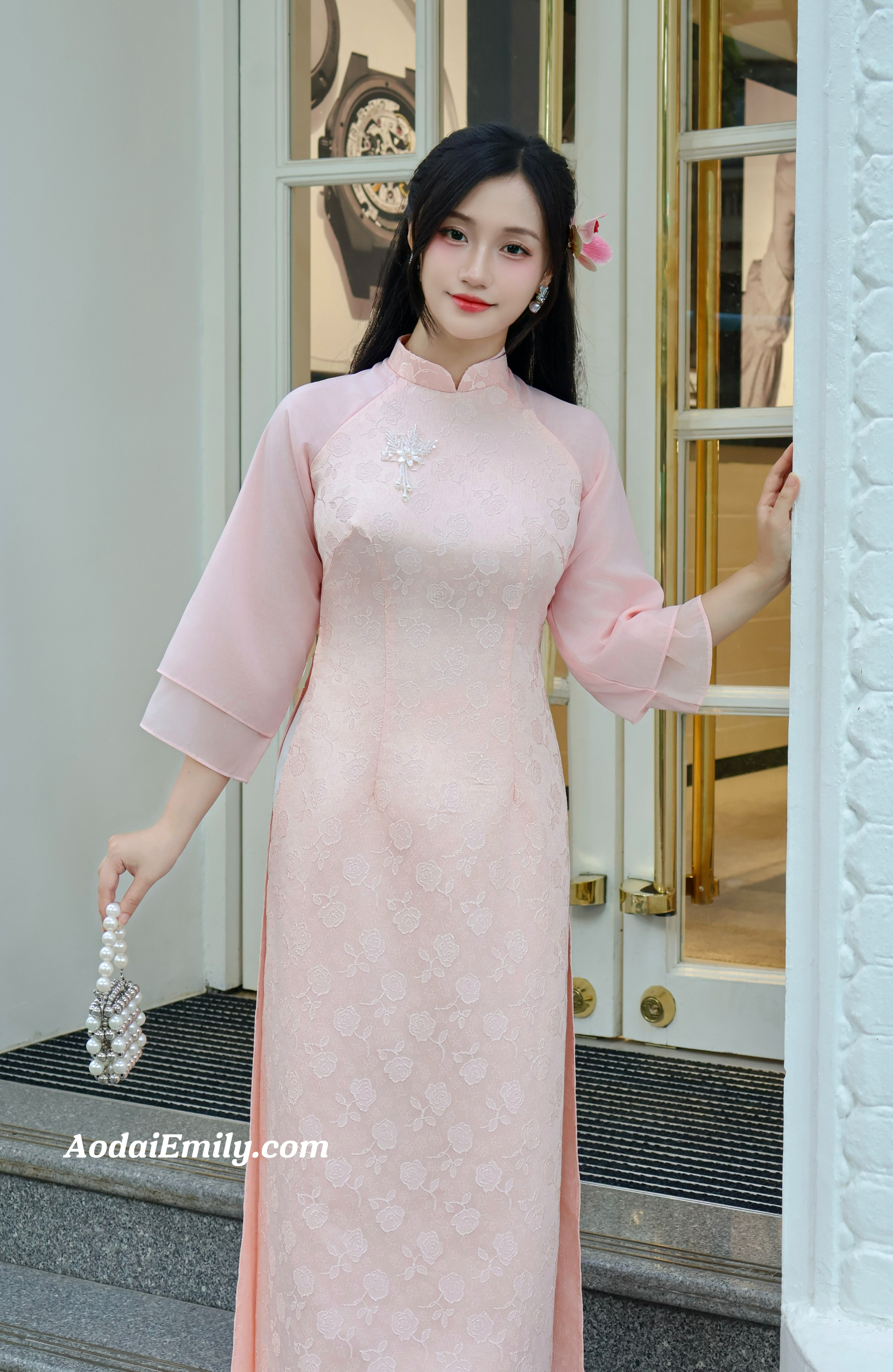 Pink modern ao dai with hand beading