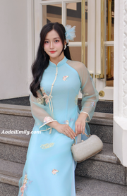 Blue modern ao dai with embroidery flowers