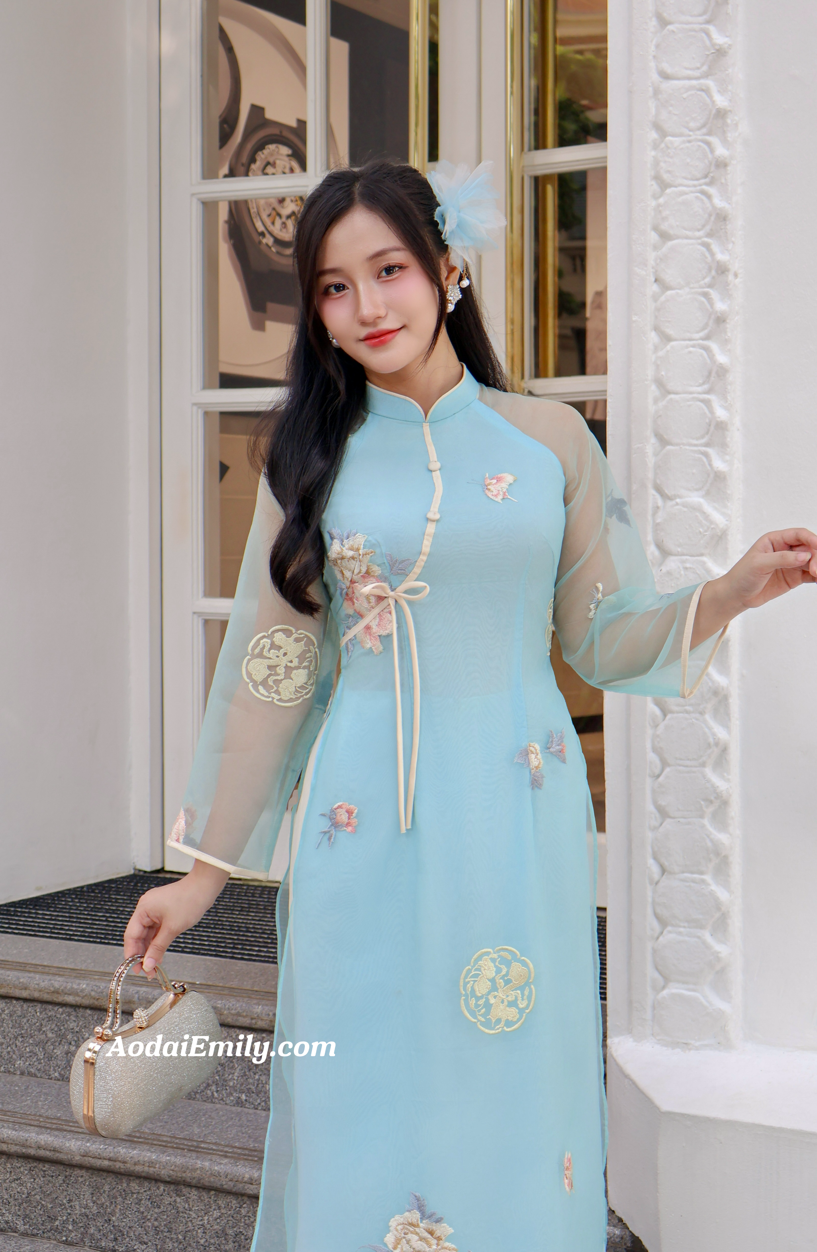 Blue modern ao dai with embroidery flowers