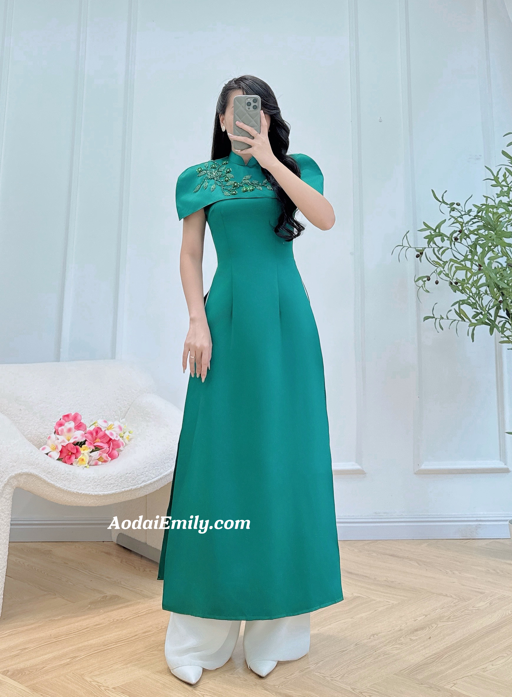 Modern green taffeta ao dai with hand beading crystals flowers