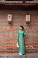 Loosing Green modern ao dai with botton collar