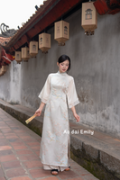 Beige Taffeta Ao dai with Spring pattern