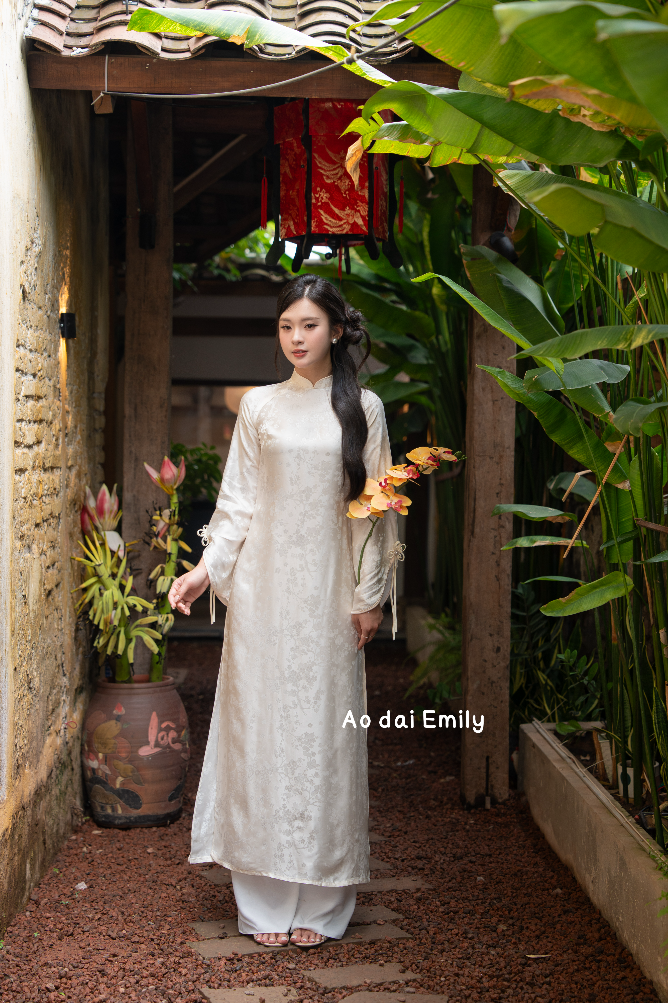 Loose cream modern ao dai with bell sleeves| Red Campion