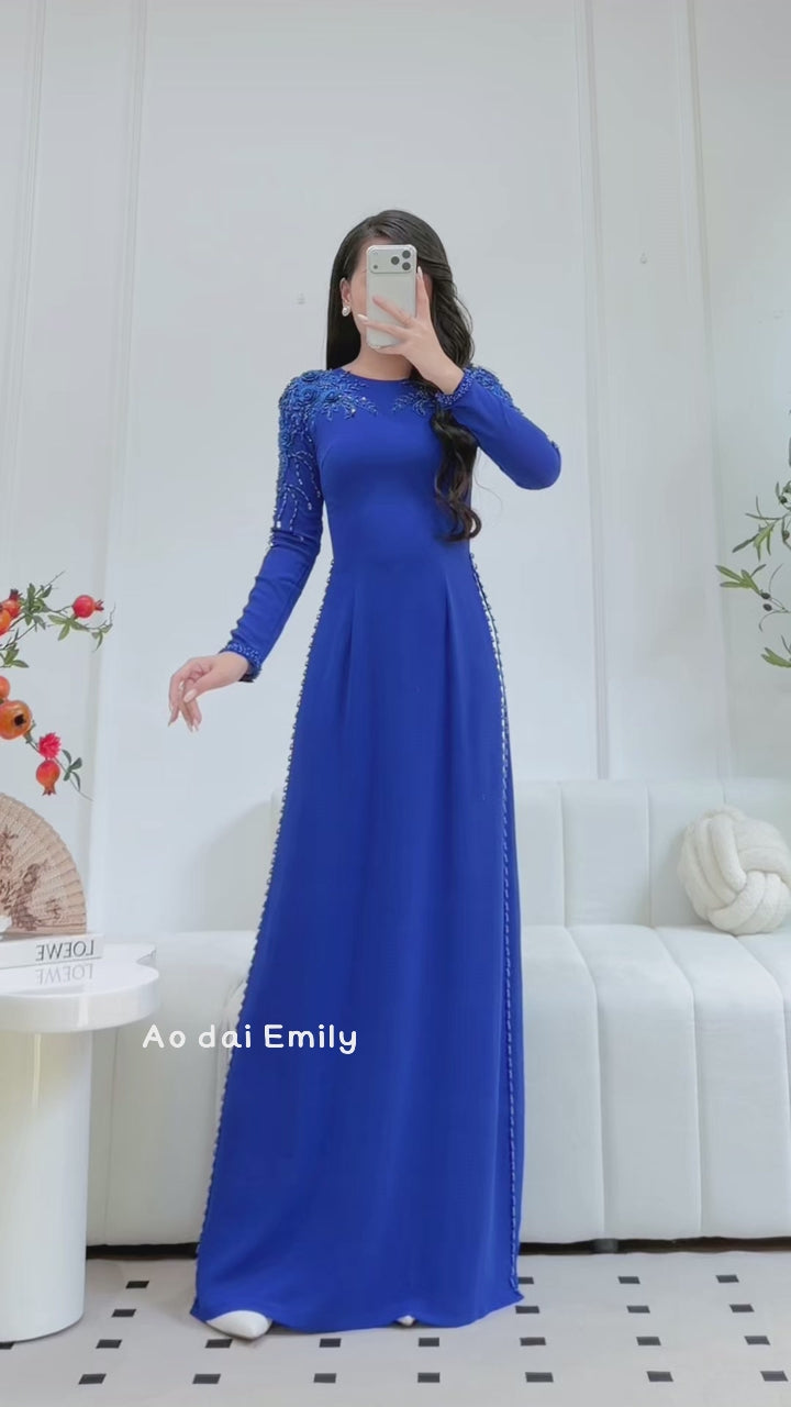 Load video: Blue ao dai with hand beading crystals and 3D flowers