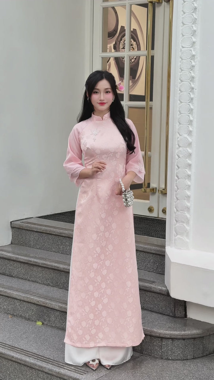 Load video: Pink modern ao dai with hand beading