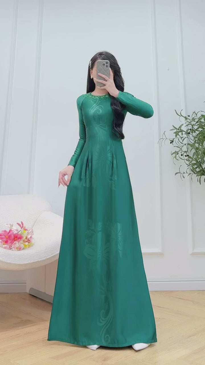 Load video: Dark Green ao dai with simple crystals rhinestones