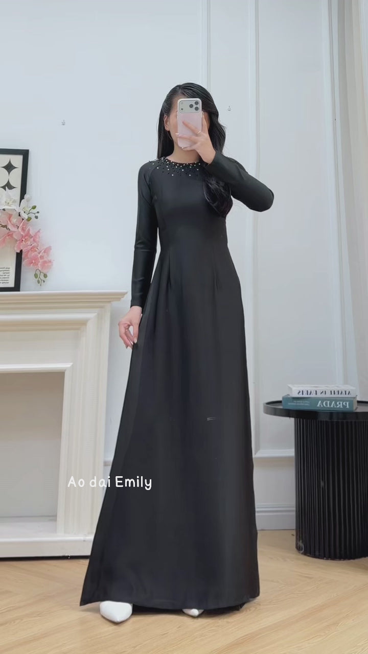 Load video: Plain Black ao dai with simple crystals rhinestones|  Quesnella
