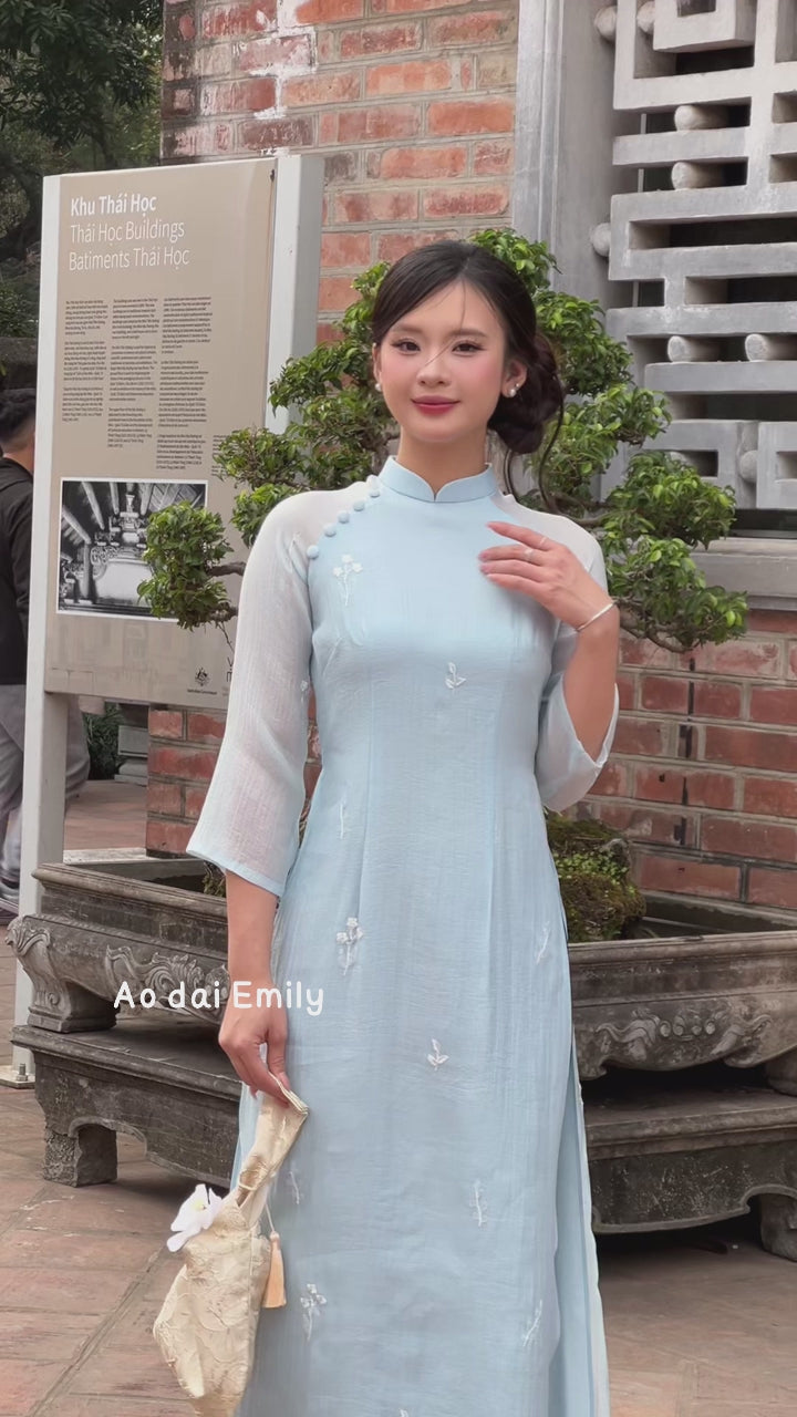 Load video: Baby blue embroidery flowers Modern ao dai| Calla lily