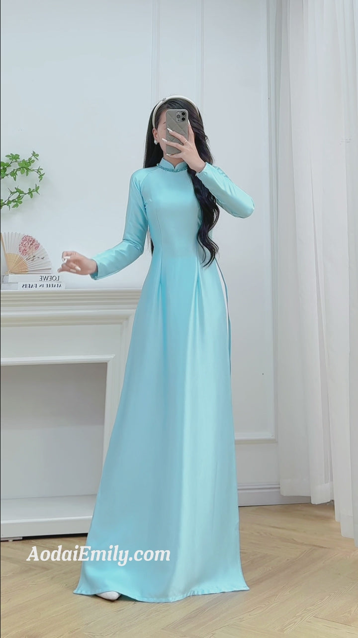 Load video: Plain Baby blue ao dai with crystals collar