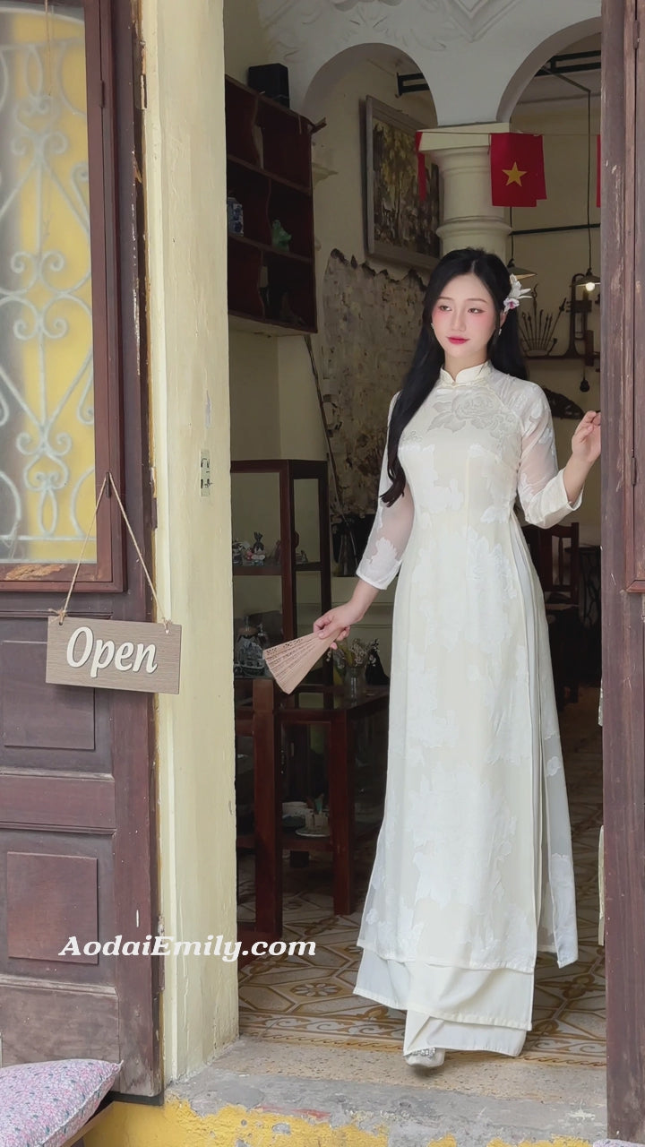Load video: Double layers Cream modern ao dai with flowers patterns