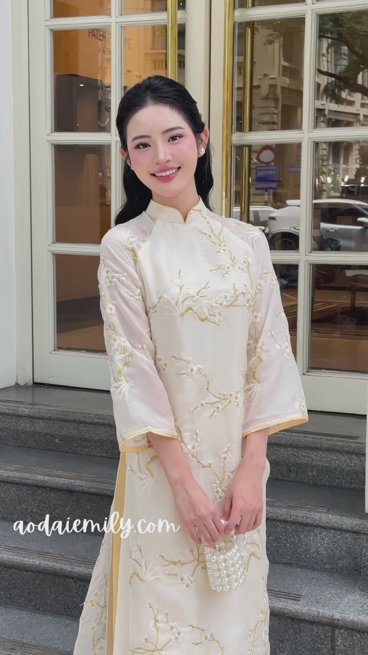 Load video: Cream/ Gold Spring flowers pattern modern ao dai set