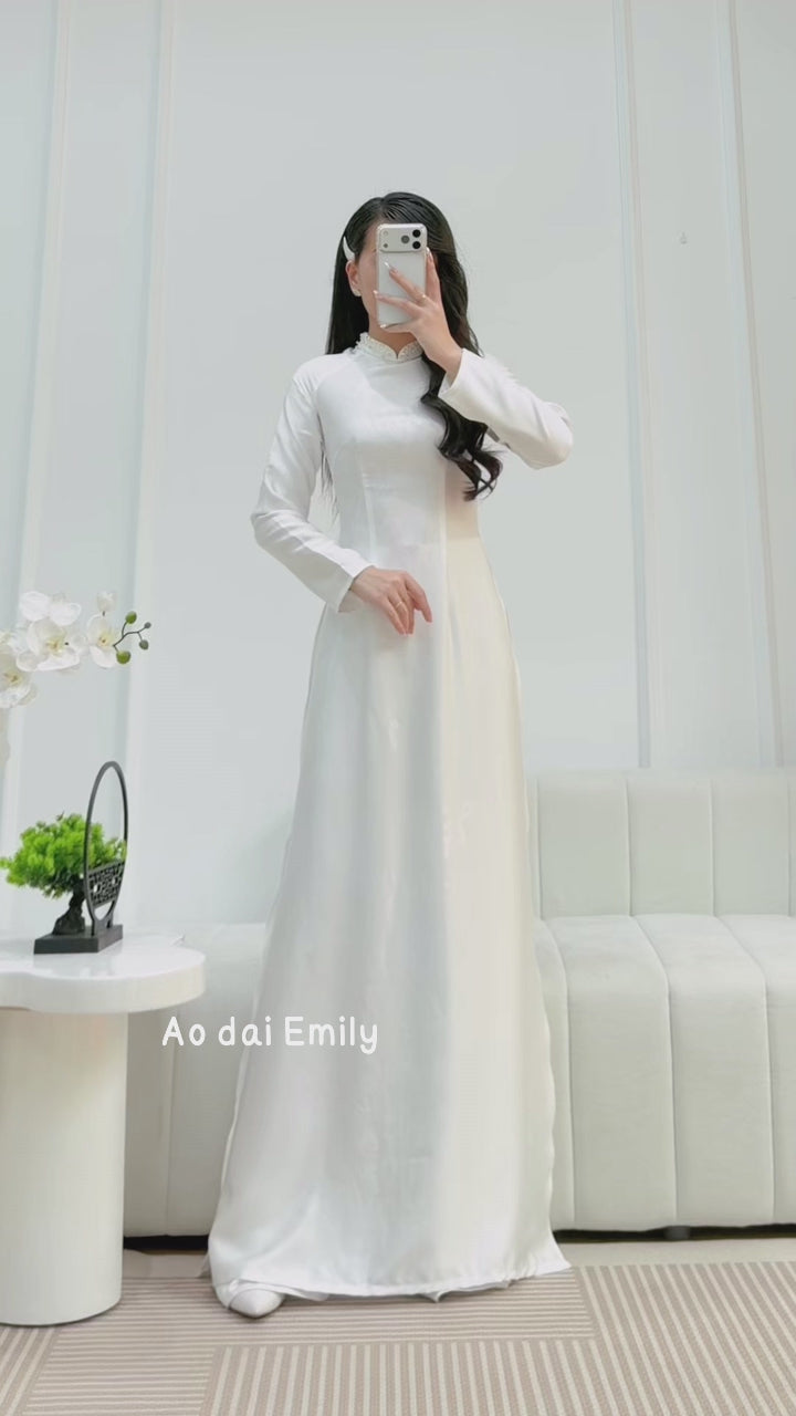 Load video: White ao dai with simple crystals rhinestones| Cockscomb