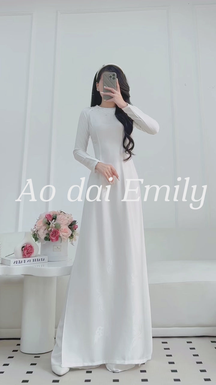 Load video: White ao dai with simple crystals round collar