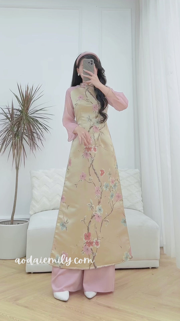 Load video: Taffeta Modern ao dai with spring patterns