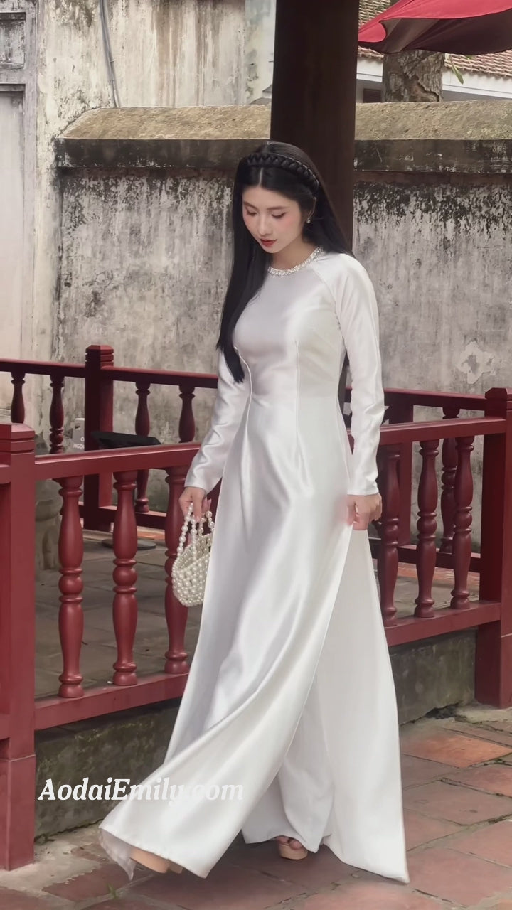 Load video: White ao dai with crystals collar