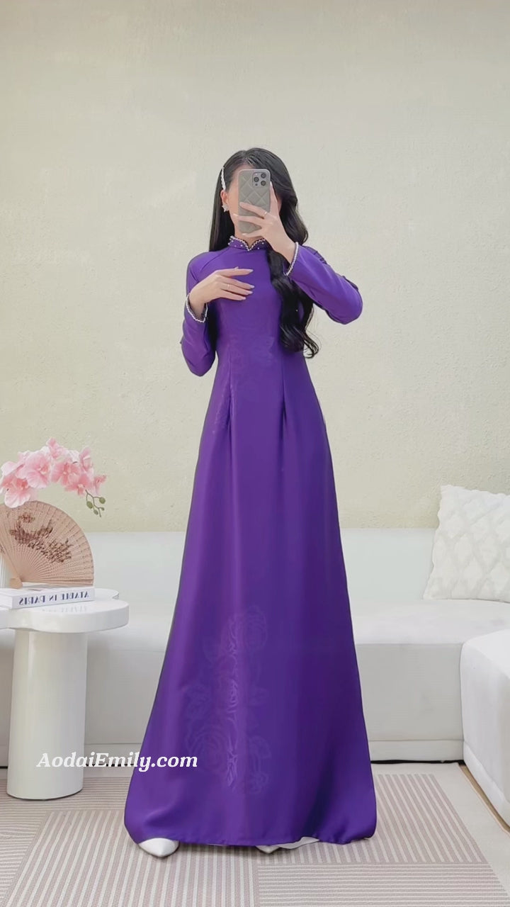 Load video: Purple ao dai with simple crystals collar