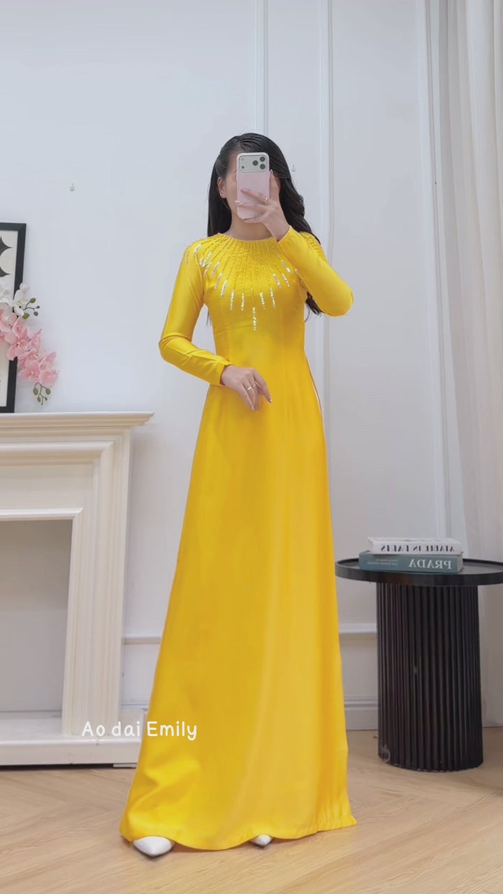 Load video: Yellow tradition Ao dai with designed crystals collar| Red hot pocker